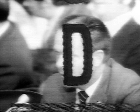 image of a man's face with the letter "D" superimposed