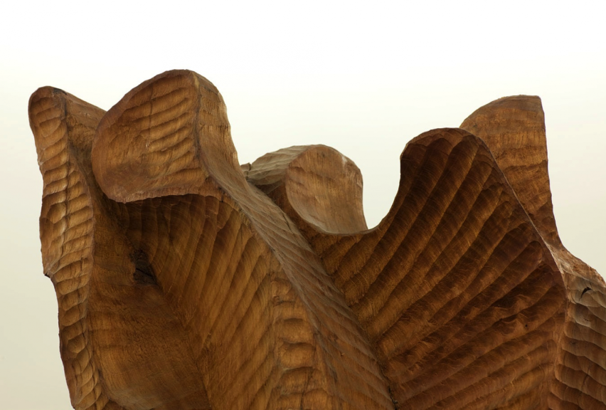 Detail of a cherry wood sculpture in a large rotunda